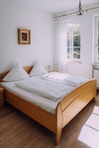 Postel nebo postele na pokoji v ubytování Europa Residenz Bad Füssing