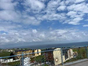 a view of the ocean from a balcony at Apartamento Los Gallegos in Foz