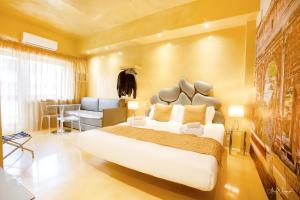 Postel nebo postele na pokoji v ubytování Magikrooms Luxury