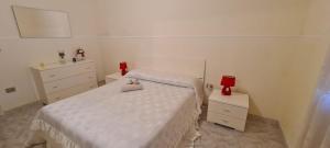A bed or beds in a room at Dimora San Gabriele