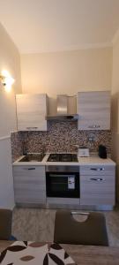 A kitchen or kitchenette at Dimora San Gabriele