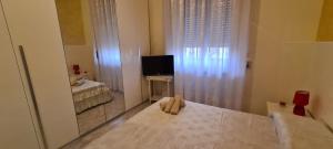 A bed or beds in a room at Dimora San Gabriele