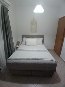 Posteľ alebo postele v izbe v ubytovaní Artemis Bakerys House 2