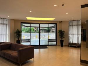 Posezení v ubytování Moura Palace Hotel