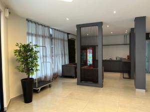 Posezení v ubytování Moura Palace Hotel