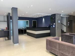 Posezení v ubytování Moura Palace Hotel