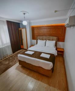 Ένα ή περισσότερα κρεβάτια σε δωμάτιο στο Parfe Apart