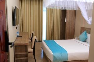 Ein Bett oder Betten in einem Zimmer der Unterkunft Hotel Next