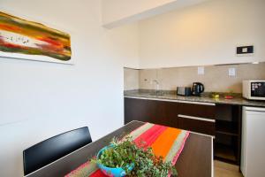 Η κουζίνα ή μικρή κουζίνα στο Ref Apart & Hotel