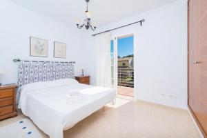 Ένα ή περισσότερα κρεβάτια σε δωμάτιο στο Villa Rosa