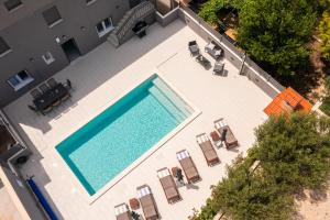 Bazén v ubytování Luxury Apartment Lorena - Private Heated Pool - nebo v jeho okolí