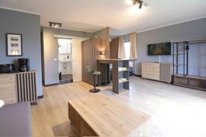 TV a/nebo společenská místnost v ubytování Harzbeat