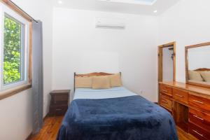 Krevet ili kreveti u jedinici u okviru objekta Spotless Cabana in West End