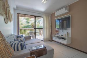 TV a/nebo společenská místnost v ubytování Barra Bali - Condomínio Pé na Areia Vista Mar