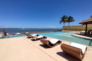 Bazén v ubytování Barra Bali - Condomínio Pé na Areia Vista Mar nebo v jeho okolí