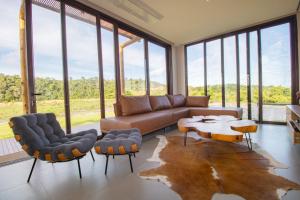 Casa De Campo Com Rio Privativo的休息区