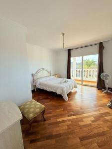 Voodi või voodid majutusasutuse Villa Playa Paraíso vista al Mar toas