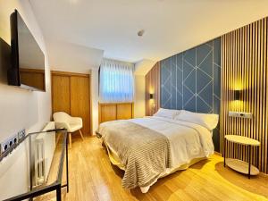 Postel nebo postele na pokoji v ubytování Hotel Ávila Diró + 37 fotografií