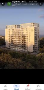 a rendering of a large white building at Apartament Alex S 405 Vogh Olimp in Olimp
