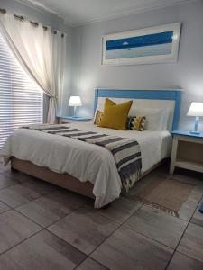 En eller flere senge i et værelse på Portobelo 6 + 11 billeder