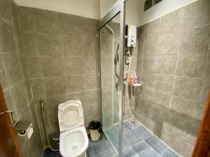 Koupelna v ubytování Muni La Maison