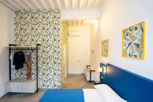 Postel nebo postele na pokoji v ubytování B&B Via Corsica 10
