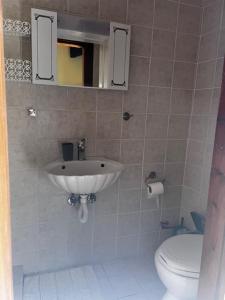 Koupelna v ubytování Voitylon