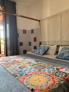 Postel nebo postele na pokoji v ubytování B&B RIO GRANDE