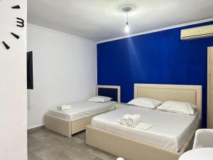 Postel nebo postele na pokoji v ubytování Bluva rooms