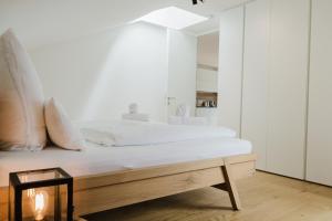 Ένα ή περισσότερα κρεβάτια σε δωμάτιο στο Rooftop Apartment - Alpstay