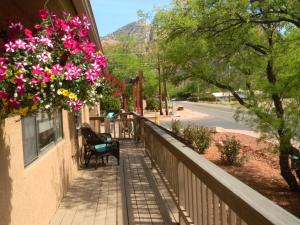 
A balcony or terrace at Whispering Creek Bed & Breakfast
