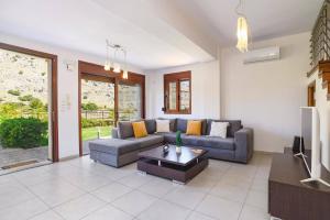 A seating area at Villa St Nicholas by Villa Plus