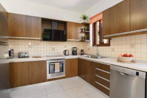 A kitchen or kitchenette at Villa St Nicholas by Villa Plus