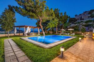 The swimming pool at or close to Villa St Nicholas by Villa Plus