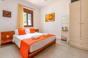 A bed or beds in a room at Villa St Nicholas by Villa Plus