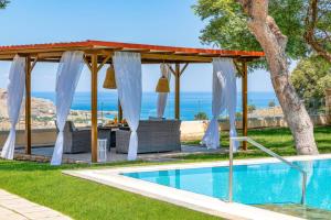 The swimming pool at or close to Villa St Nicholas by Villa Plus