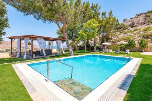 The swimming pool at or close to Villa St Nicholas by Villa Plus