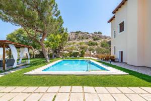 The swimming pool at or close to Villa St Nicholas by Villa Plus
