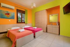 A bed or beds in a room at Villa St Nicholas by Villa Plus