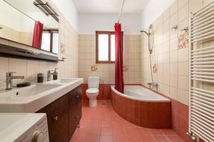 A bathroom at Villa St Nicholas by Villa Plus