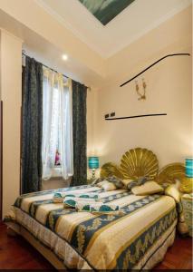 Tempat tidur dalam kamar di Sancta Scala