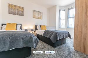 Ένα ή περισσότερα κρεβάτια σε δωμάτιο στο 3BR House in Warrington Ideal for Contractors & Work Stays with Free WiFi and Free Street Parking
