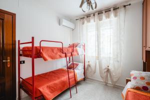 Una cama o camas en una habitación de Casa Mariangela