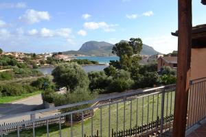 a view of a river from the balcony of a house at Residence Orizzonti 34 in Golfo Aranci