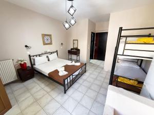 Katil atau katil-katil dalam bilik di Thassos Studio