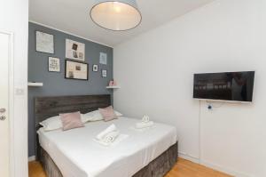 Postel nebo postele na pokoji v ubytování Apartments Katica