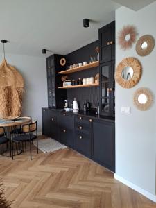 Nhà bếp/bếp nhỏ tại Apartament z basenem Ustronie Morskie