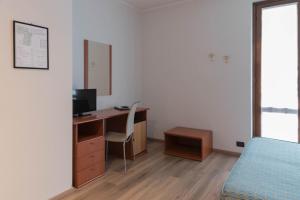Postel nebo postele na pokoji v ubytování Albergo Ristorante Orazio