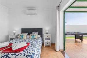Postel nebo postele na pokoji v ubytování Villa Bonaci + 15 fotografií