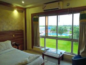 Imagem da galeria de Hotel Girish & Resort em Diamond Harbour